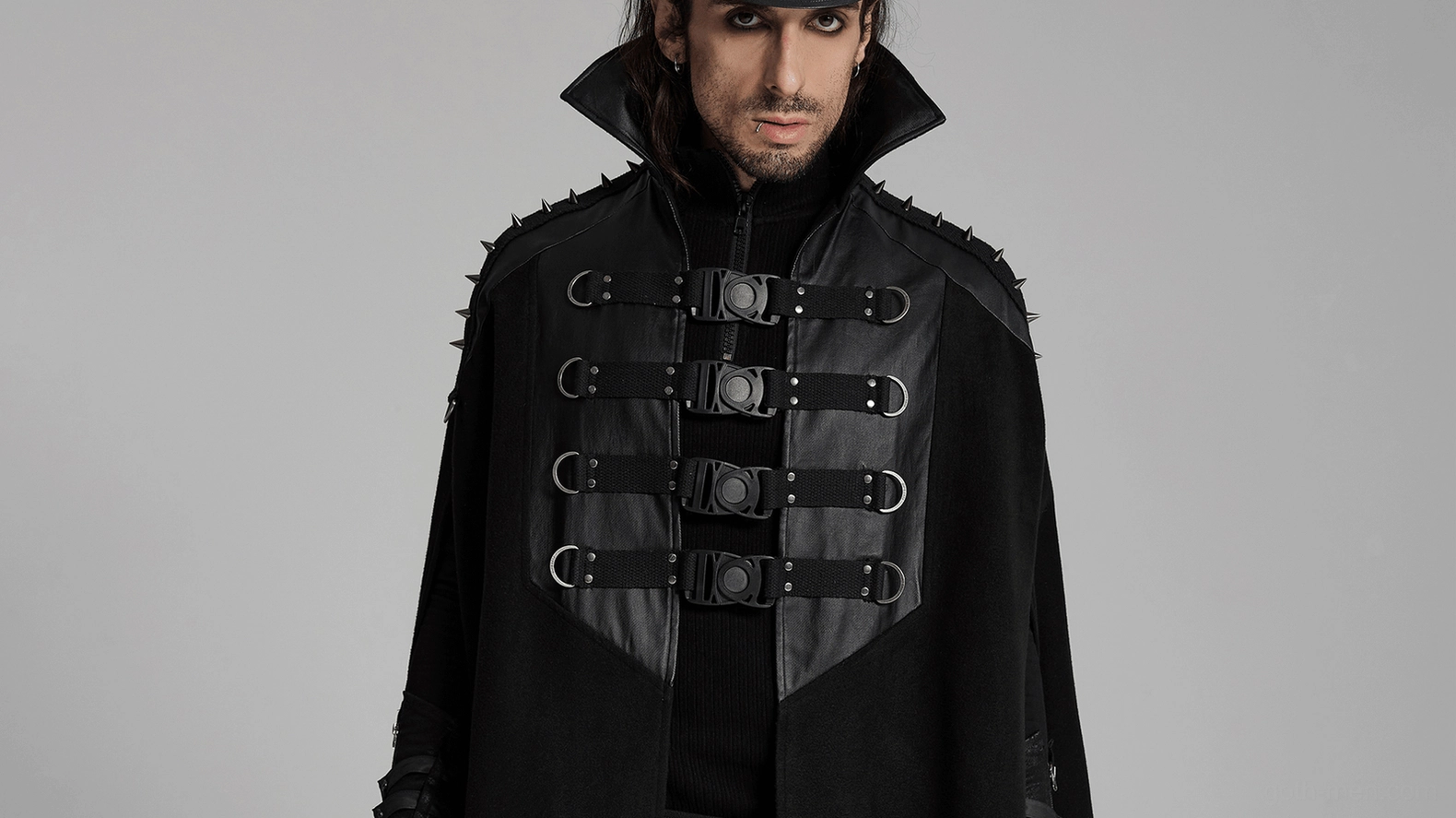 Gothic black wool cape with rubberized fabric finish and metallic buckle accents detail