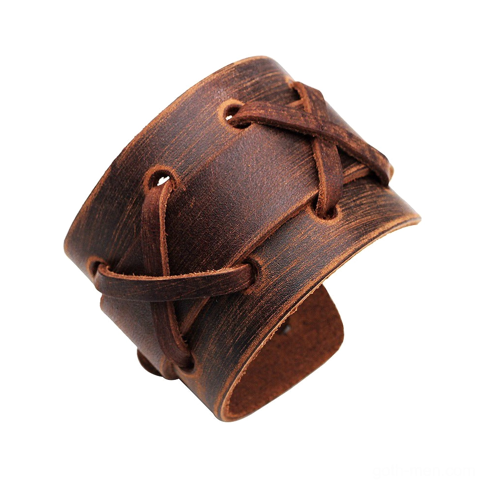 Distressed vintage brown leather cross-lace gothic wristband showing aged patina and hand-stitched details from oblique angle