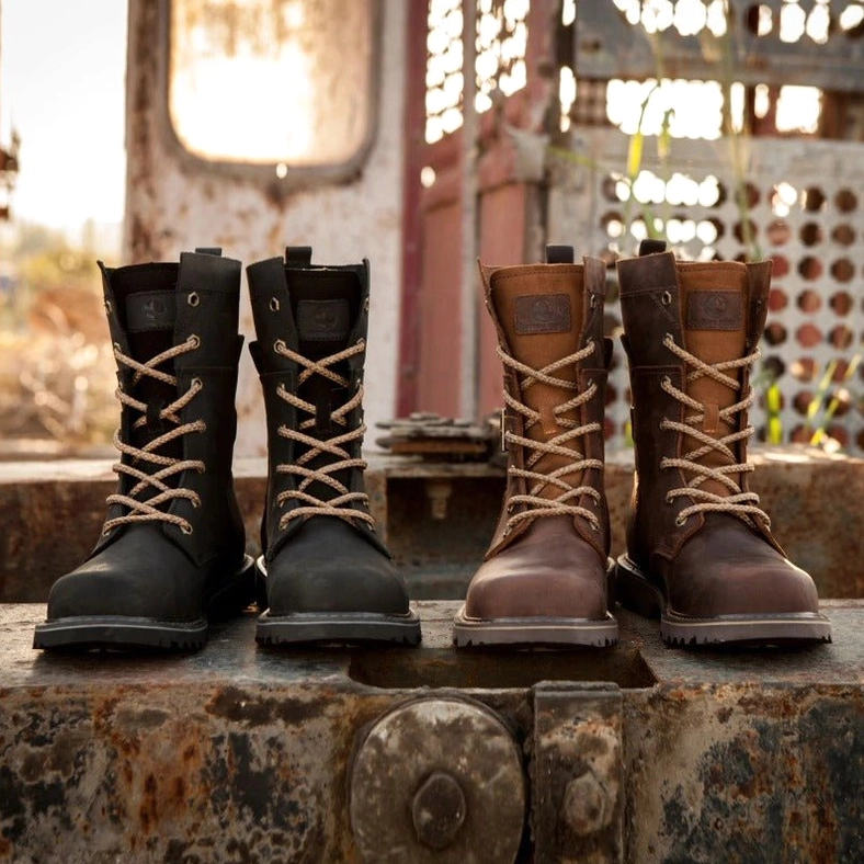 Brown weathered leather gothic boots close-up showing distressed leather texture and hardware details