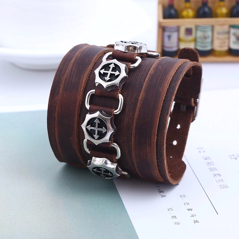 Brown leather gothic punk bracelet side close-up, zinc alloy cross stud details, genuine leather texture