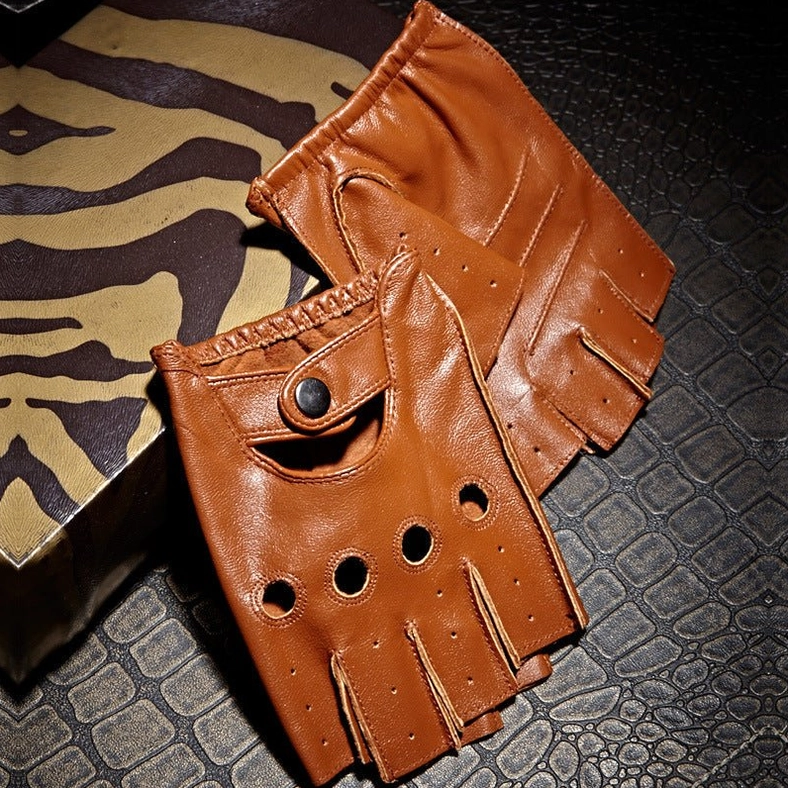 Brown half-finger leather gloves with perforated ventilation holes and snap button wrist, textured animal print background