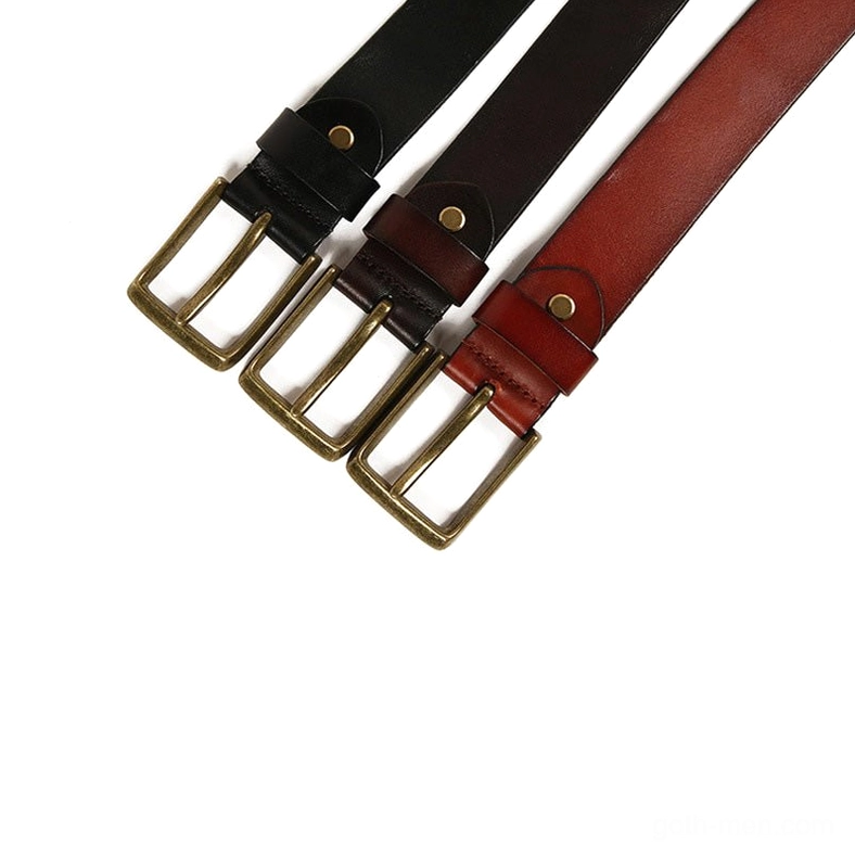 Burgundy gothic belt with geometric bronze metal stud pattern, fashion accessory view