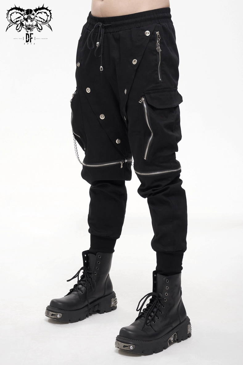 Angular view of black cargo pants emphasizing industrial design elements and metal accents