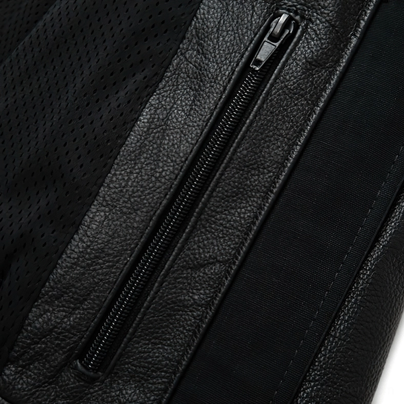 Chest pocket and zipper detail on black leather gothic motorcycle jacket