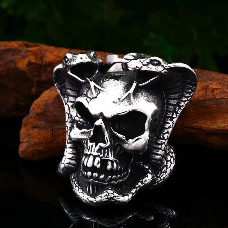 Cobra skull pendant close-up front - intricate serpent and skull detail photography