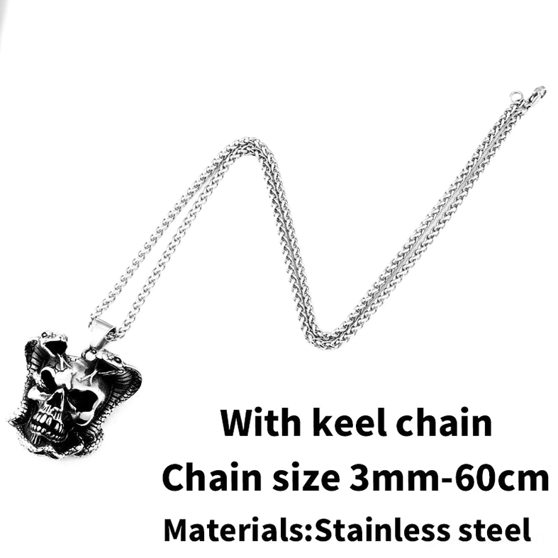 Cobra skull pendant with keel chain flat lay - angular gothic necklace design