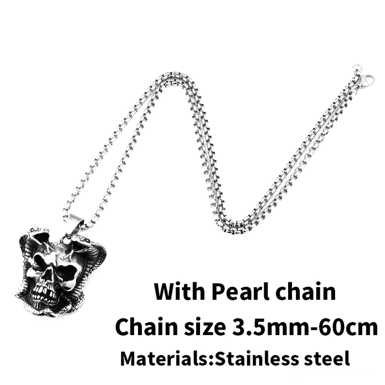 Cobra skull pendant with pearl chain flat lay - elegant gothic jewelry piece
