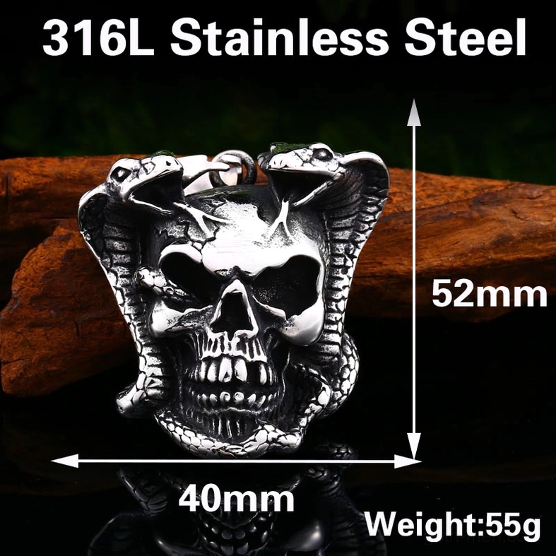 Stainless steel cobra skull gothic pendant on wooden background - product display