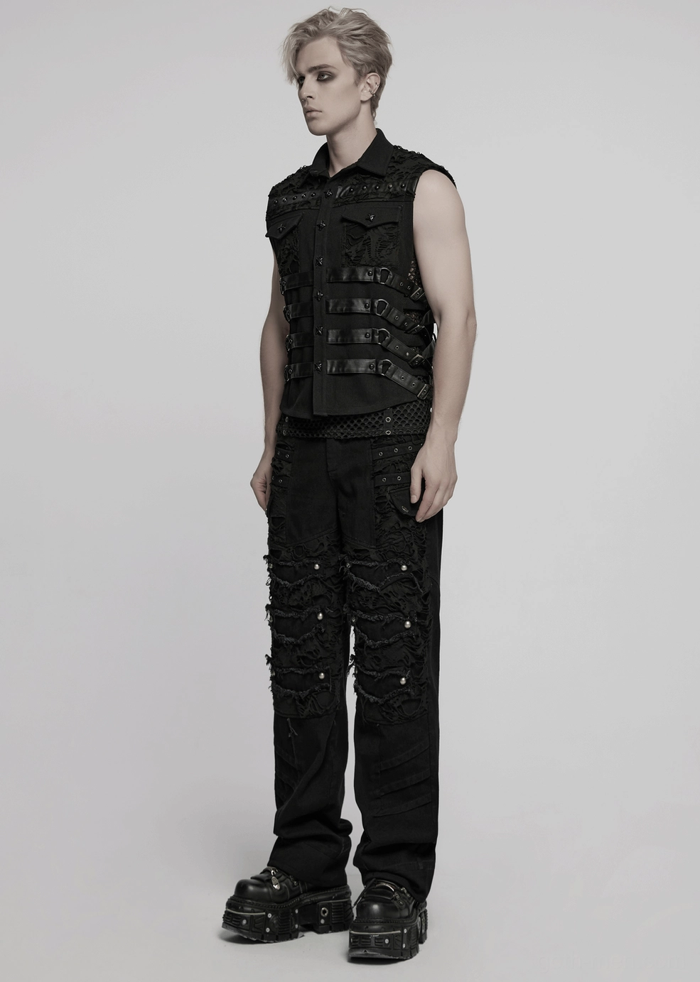 Industrial gothic vest back view detail - armor spine configuration, perforated protective panel design, and leather attachment point hardware