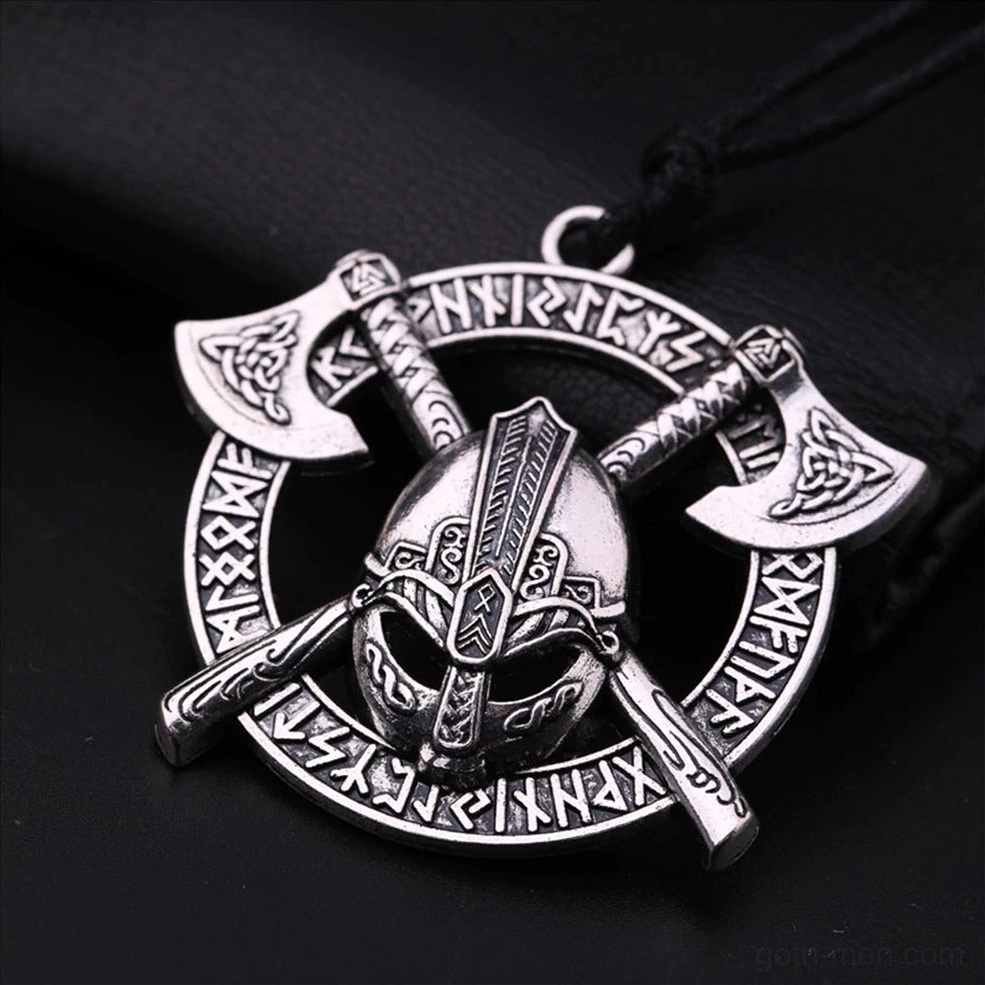 Silver stainless steel gothic axe pendant necklace on dark fabric backdrop