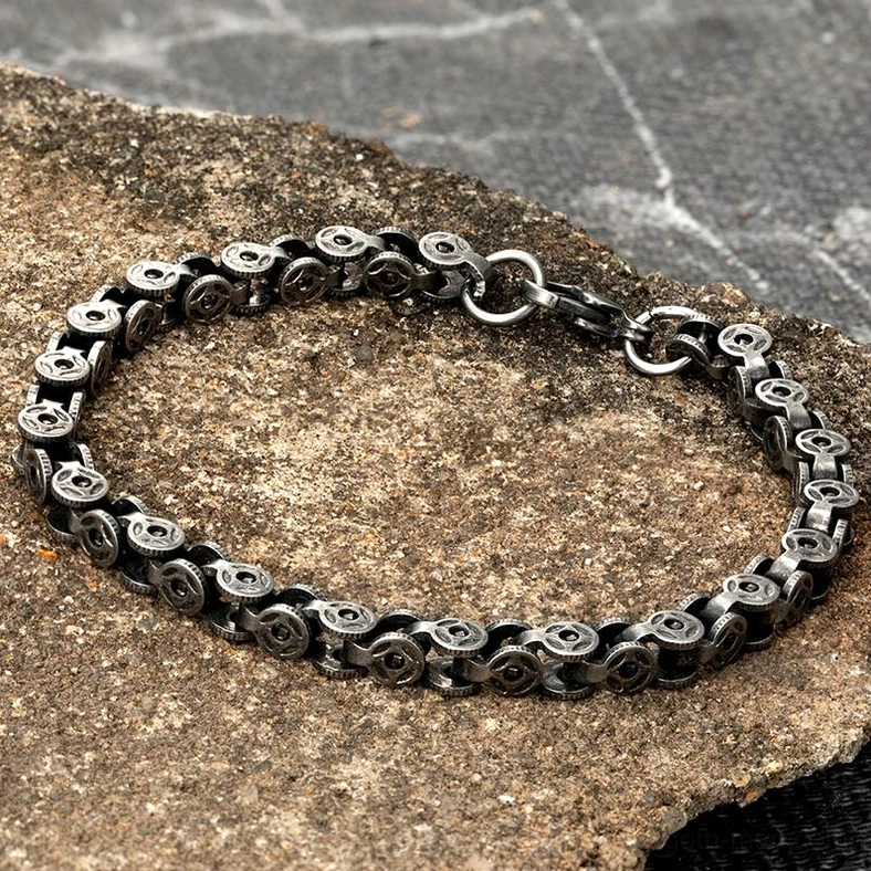 gothic chain bracelet for men dark silver stone background industrial texture