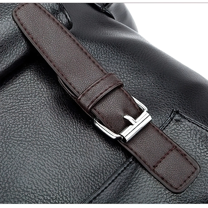 Black utility backpack front buckle details highlighting industrial hardware and structural design elements