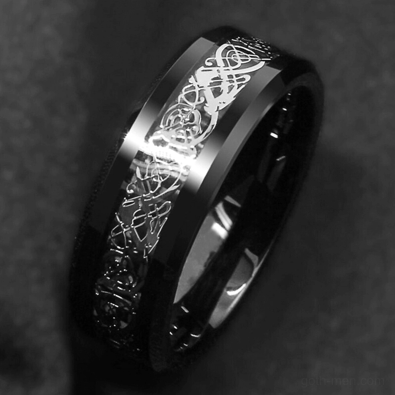 Polished black dragon ring side profile with light reflection highlighting beveled band edges