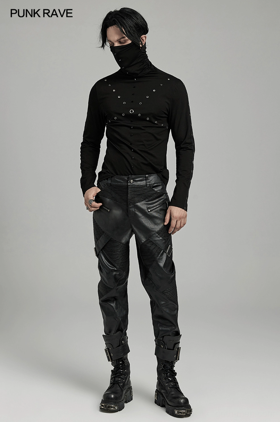 Front quarter view of drawstring gothic pants highlighting dimensional drawstring panel and hip placement