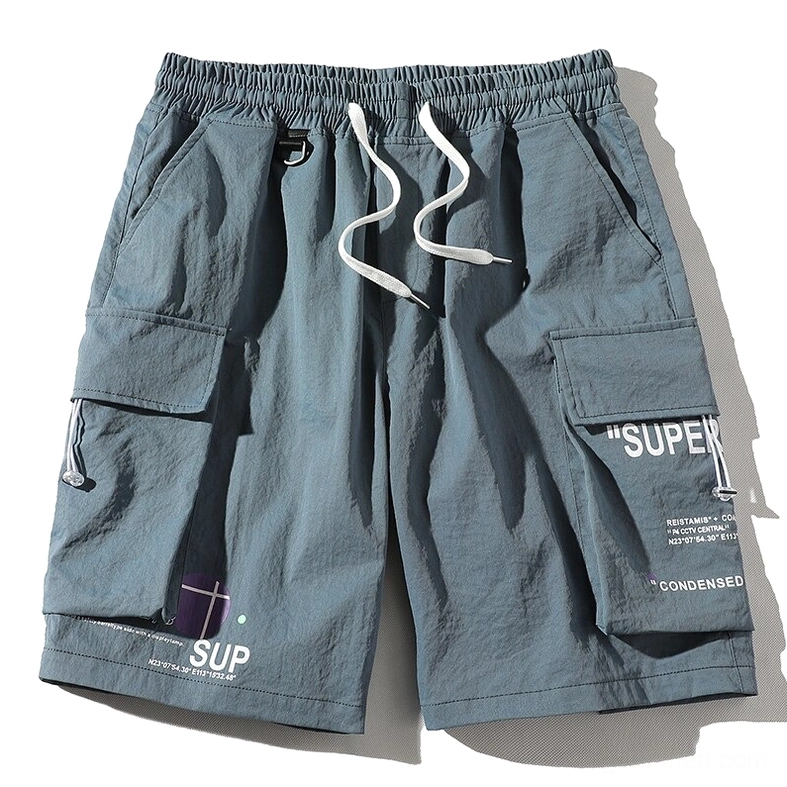 Dusty blue gothic cargo shorts with elastic drawstring and printed pocket details - front view