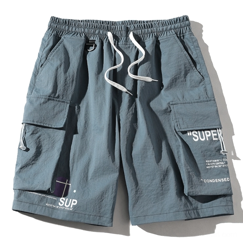 Dusty blue men's cargo shorts with multi-pocket utility design - studio quality image