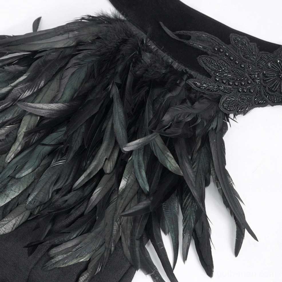 Extreme close-up of feather collar accessory on gothic cape, displaying fluffy black feathers and embroidered appliqué details