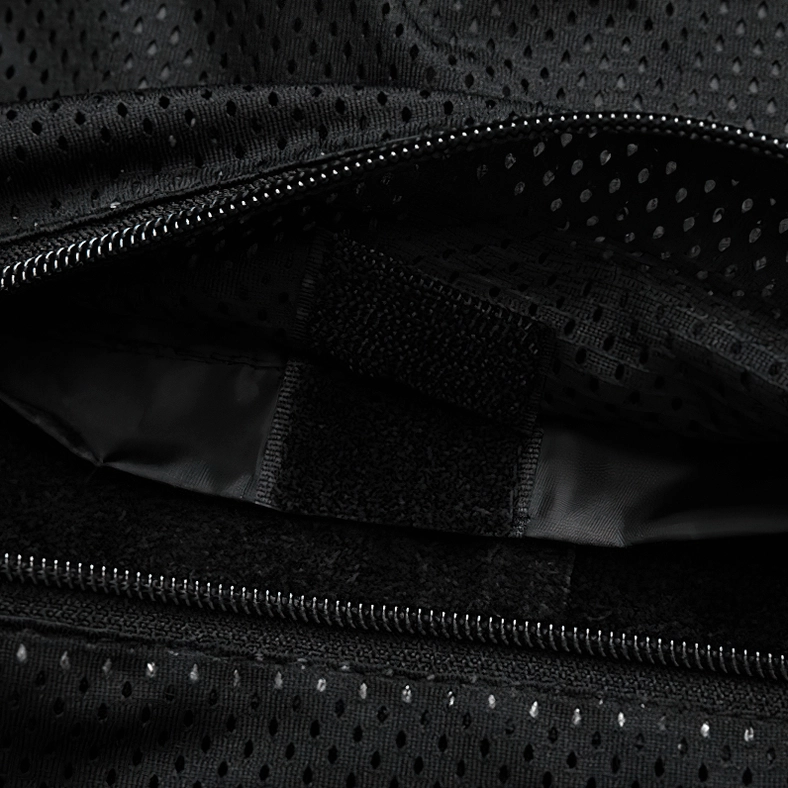 Front zipper track and pebbled leather texture of black gothic jacket