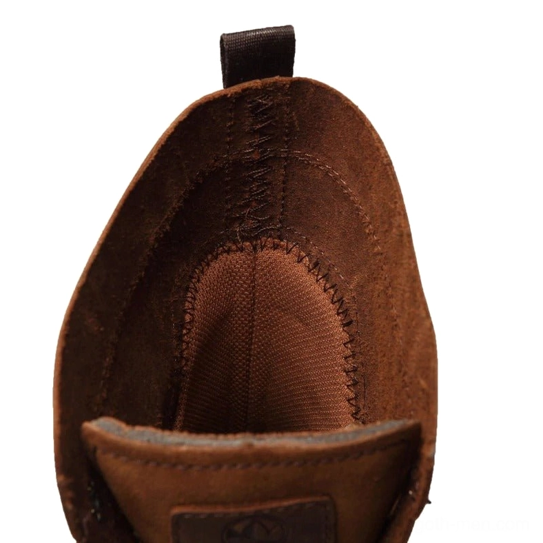 Gothic combat boots detail shot featuring genuine leather construction and distressed patina finish