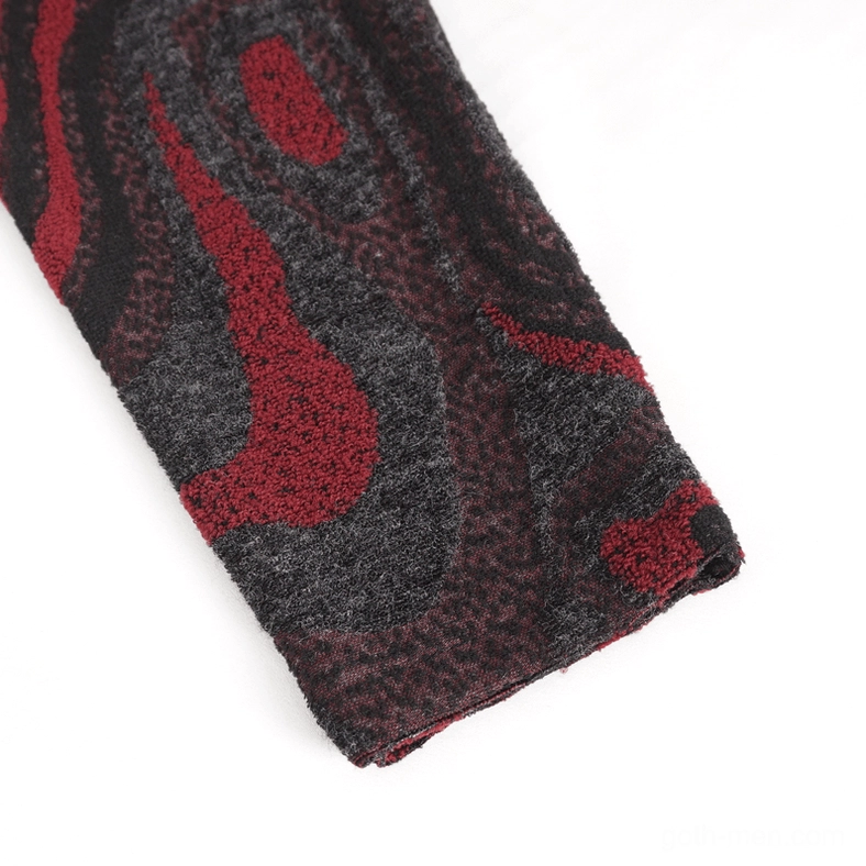 Close-up detail of fingerless sleeve cuff on gothic coat with red-black marbled woven fabric texture