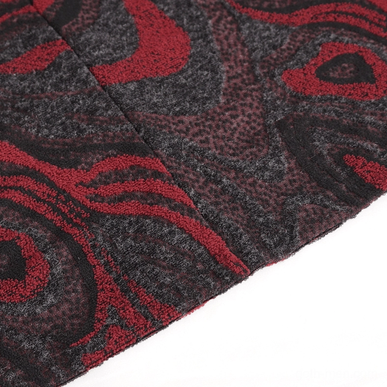 Detailed close-up of swirled red-black marbled textile pattern on gothic coat with fuzzy woven surface texture