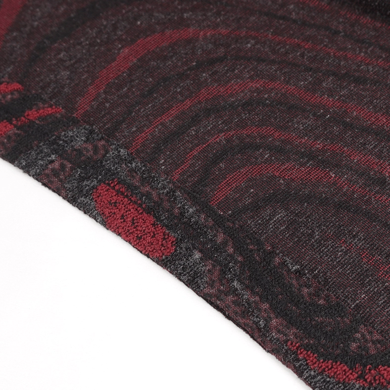 Angle detail of men's gothic chain-back hooded coat showing asymmetrical construction and fabric drape movement