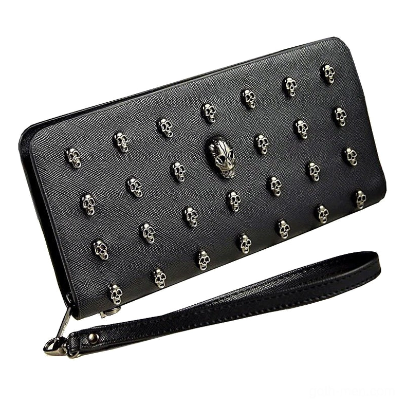 Black PU leather skull studded wallet right angle view - full view of skull embellishments and wrist strap
