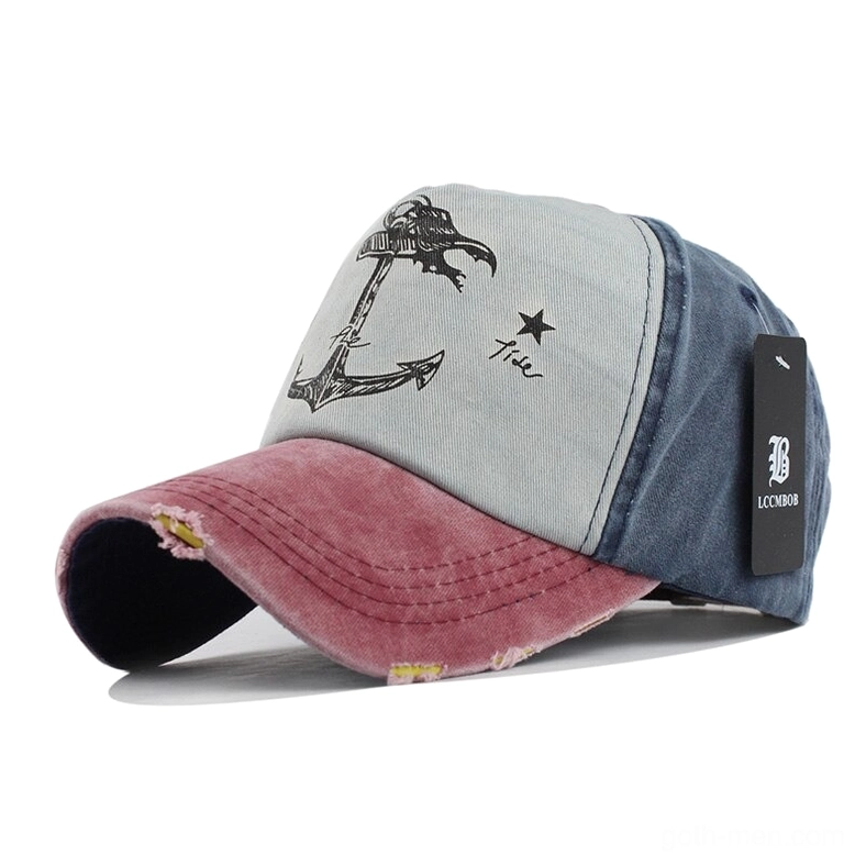 Red and navy alternative snapback hat with anchor and star motif, worn aesthetic