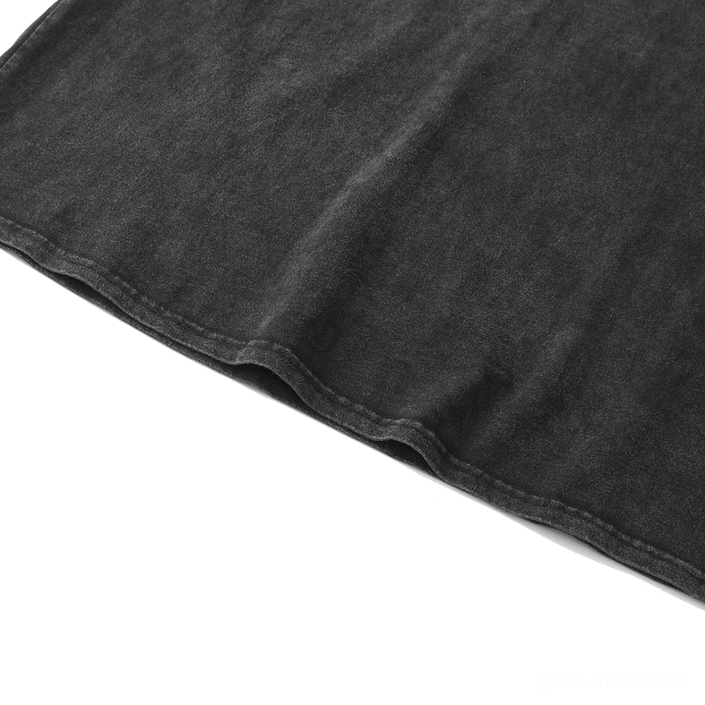 Side lower hem detail of faded black gothic anime distressed tank top