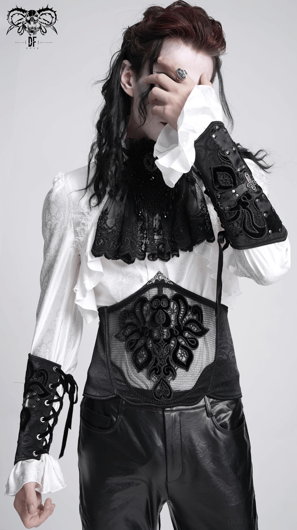 Black gothic lace-up arm guard product photography highlighting cross pendant and leather-like surface finish