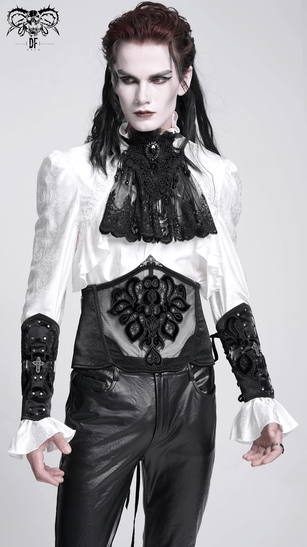 Overhead detail view of gothic arm guard displaying lace fastening system and metal rivet placement pattern