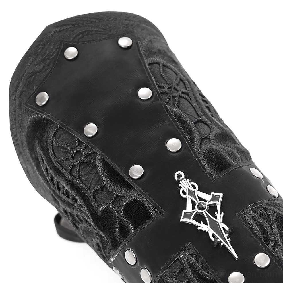 Front close-up of gothic arm guard displaying studded rivets, cross charm, and black leather-like texture detail
