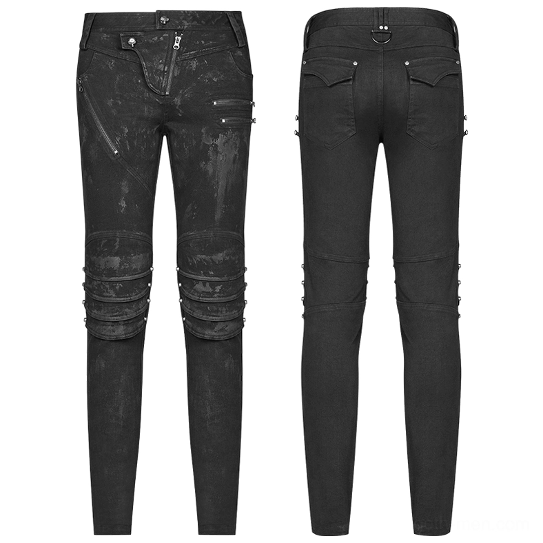 Distressed black denim jeans with layered knee armor - front flat lay product shot
