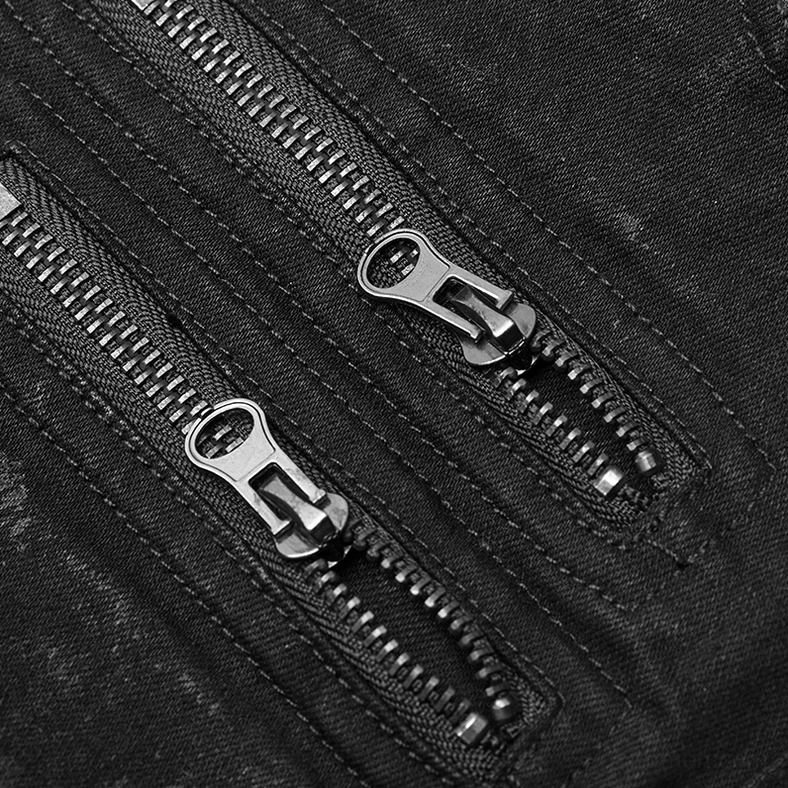 Precision stitching and dual zipper pulls close-up on gothic distressed denim jeans