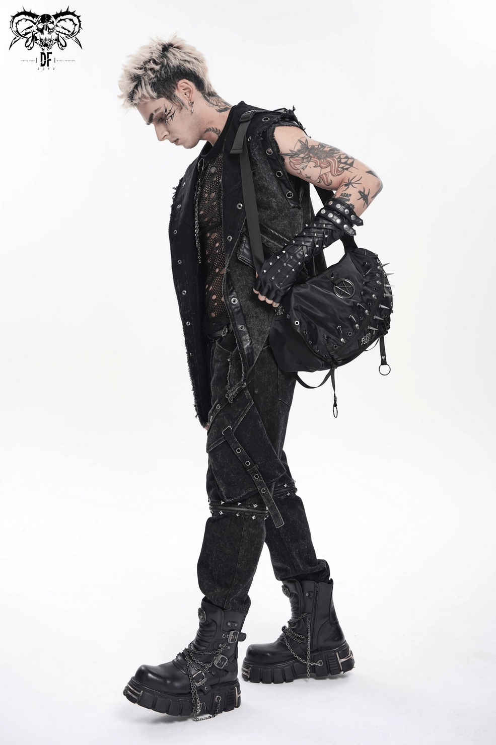 Alternative carrying position demonstration of gothic studded bag worn across body