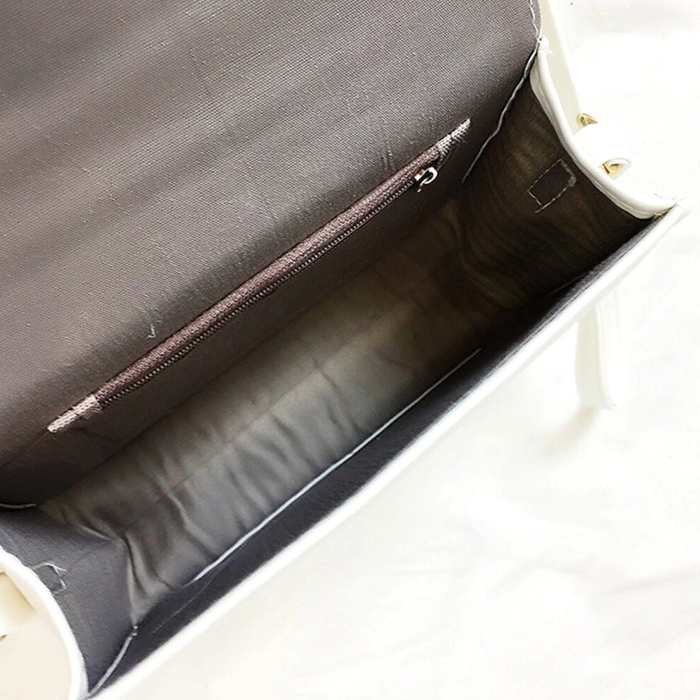 Gothic letter shoulder bag interior and exterior design showcase on white bedding background
