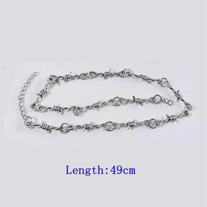 Coiled barbed wire gothic necklace showing full 49cm length and chain thickness detail on grey background, demonstrating product construction and silver metal material