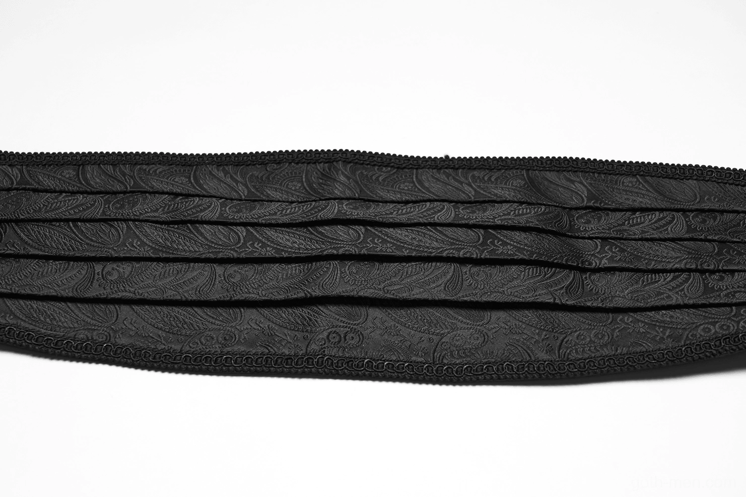 Side flat view of black jacquard gothic belt highlighting embossed fabric texture and horizontal pleated design details