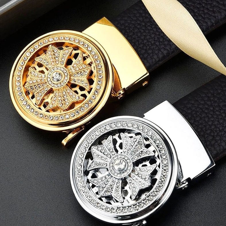 Two gothic automatic buckle belts comparison showing silver and gold rhinestone-carved buckles on black leather