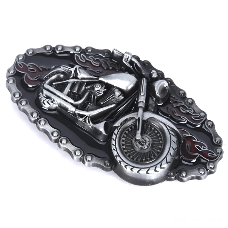 Front three-quarter angle of embossed motorcycle belt buckle showing detailed relief work, chain border, and flame motifs on silver-black metal