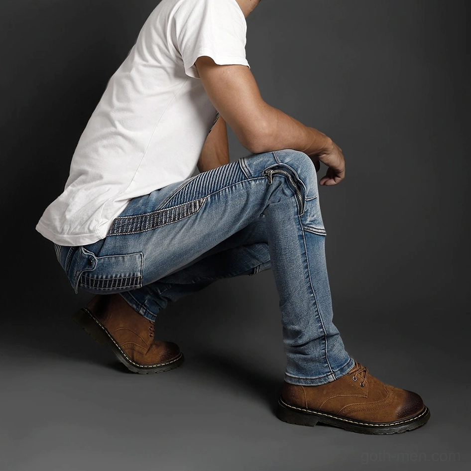 Light blue gothic biker jeans crouching position side view knee stitching detail