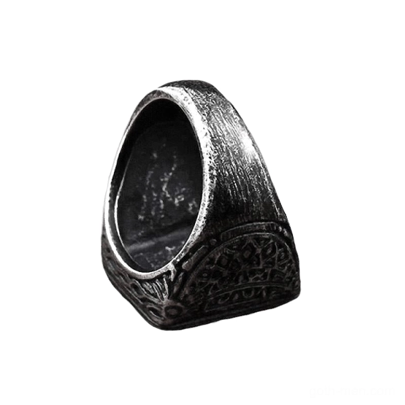 Gothic biker ring side interior view showing carved engraved details on aged black metal