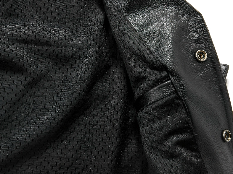 Black pebbled leather gothic vest side view with snap buttons and mesh lining