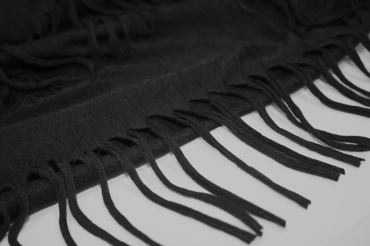 Men's gothic black fringe t-shirt size comparison - fitted silhouette distressed mesh and studs creating dimensional punk aesthetic