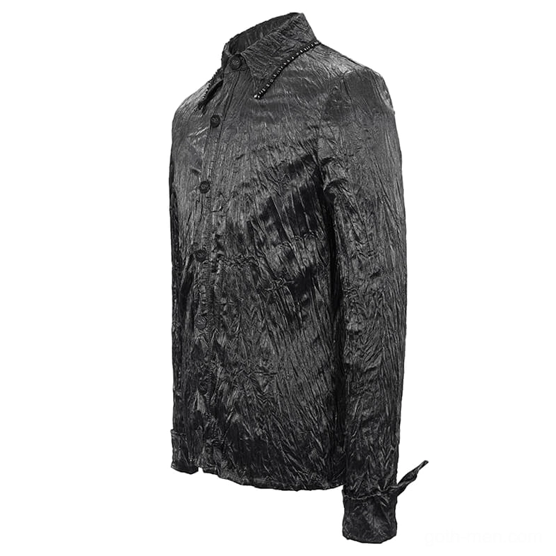 Black gothic punk rock shirt three-quarter flat lay showing crinkled fabric texture and tailored construction