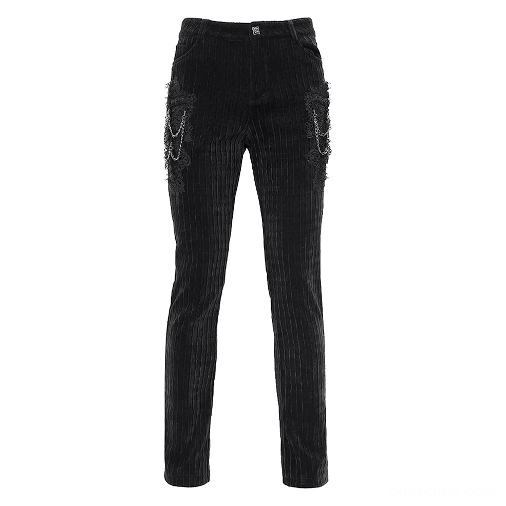 Black velvet chain gothic pants with embroidered cross pocket details - side front angle view
