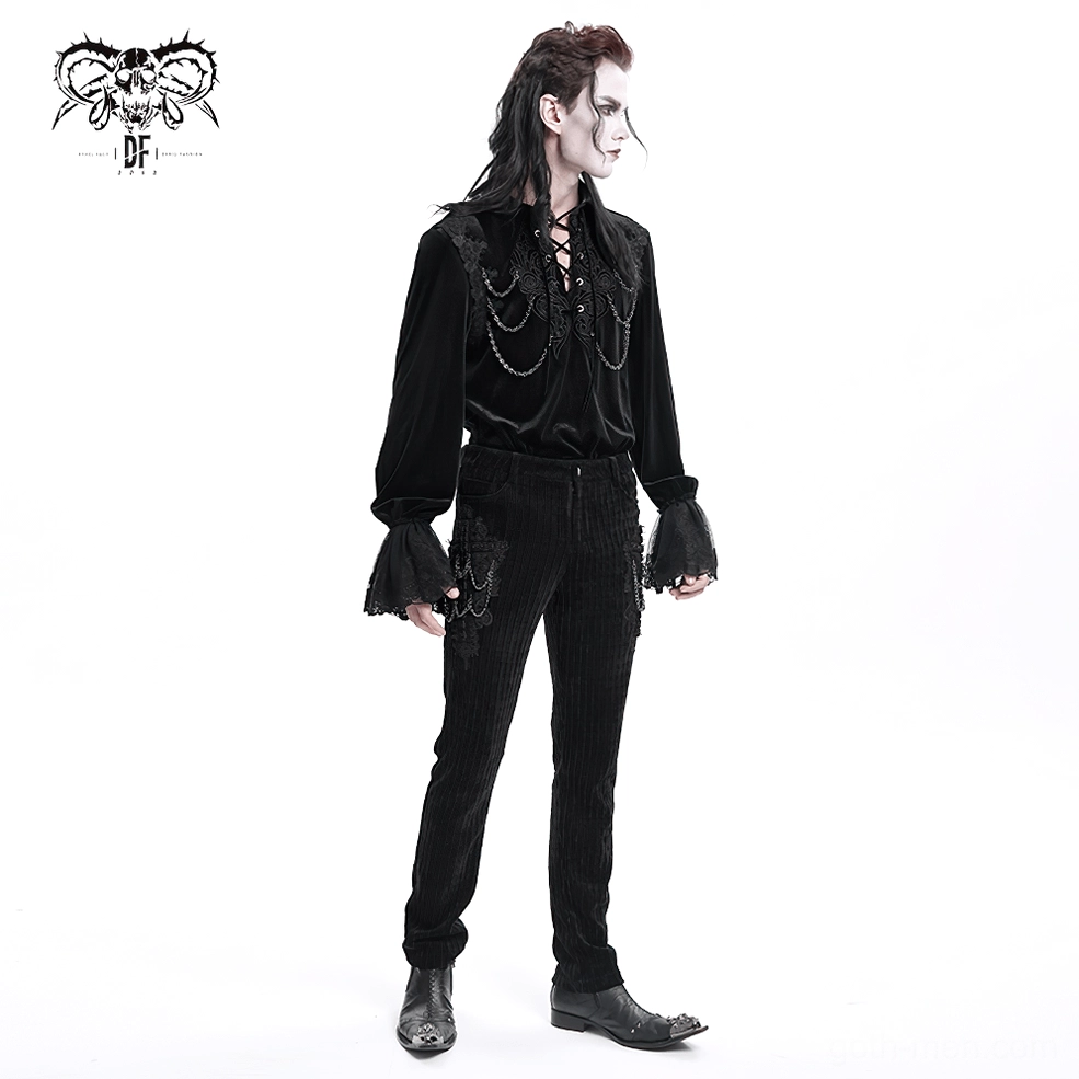 Black velvet gothic trousers slim fit cut - side profile showing leg tapering and chain accents