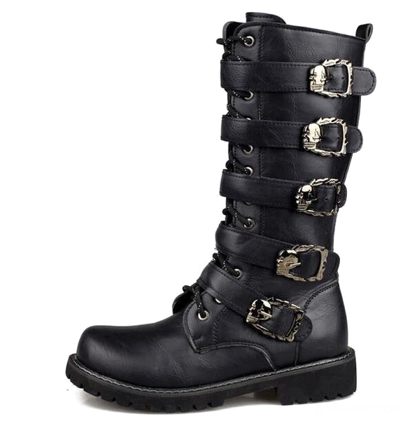 Gothic combat boot front view featuring lace-up closure and cascading metal skull buckles