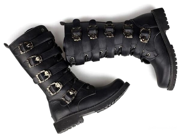 Pair of skull buckle gothic boots laid flat overhead view displaying stacked strap design and mid-calf silhouette