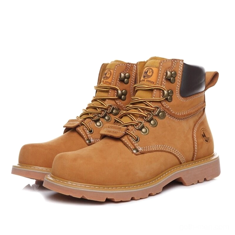 Tan suede work boots with contrast heel panel - front three-quarter view showing genuine leather construction and lace-up closure